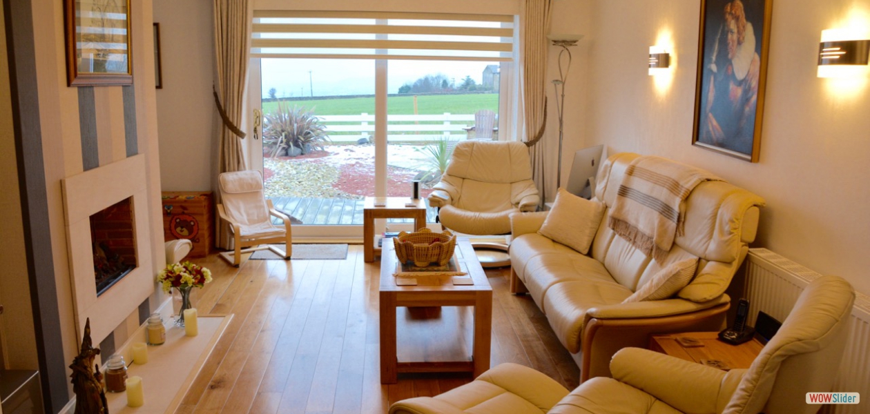 The floors are solid Oak and this room leads onto the dining room.