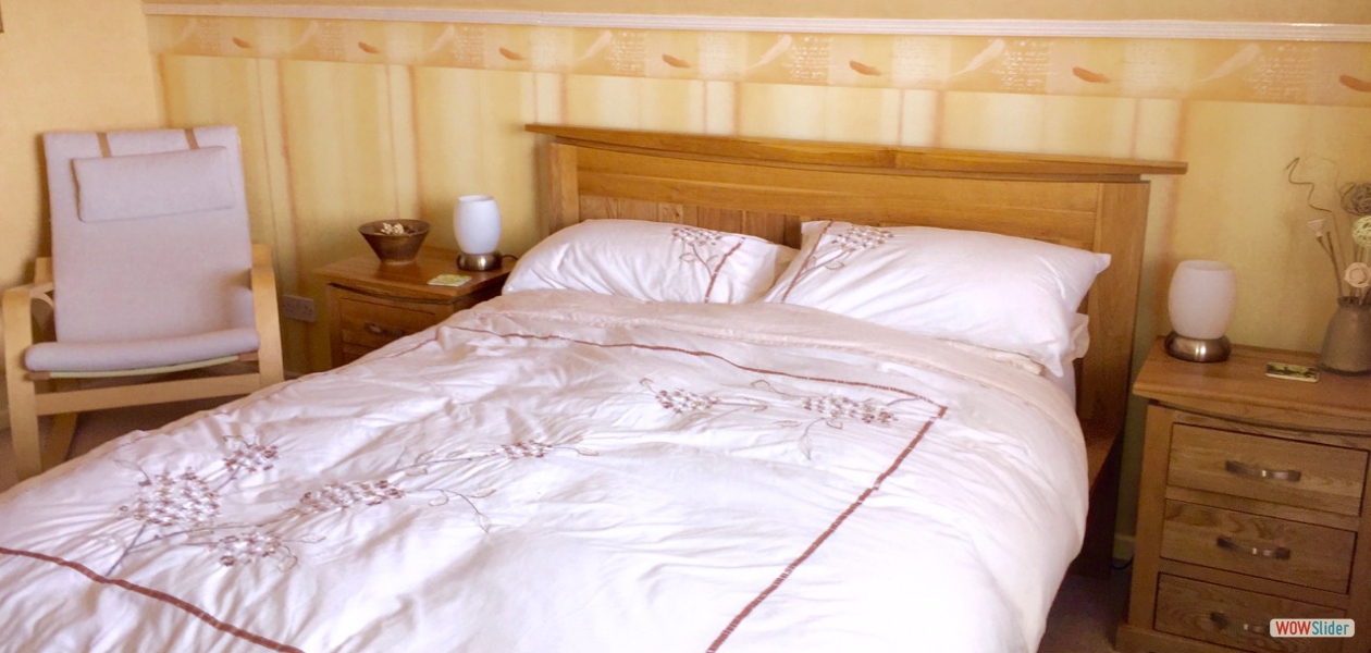 Upstairs there are two additional bedrooms and the den.